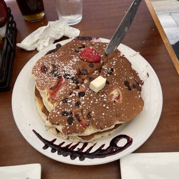 Naked Cafe - Strawberry Chocolate Chip Pancakes - Breakfast & Brunch Near Me - Solana Beach, California Naked Cafe - Strawberry Chocolate Chip Pancakes - Breakfast & Brunch Near Me - Solana Beach, California
