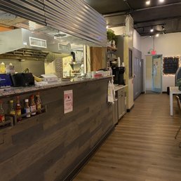 a view of the kitchen from the dining area