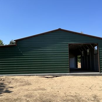The Carport Experts - Main Roll Up Door Entrance. (South) - General Contractors Near Me