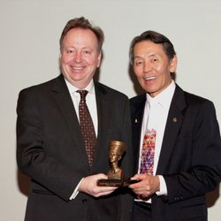 Grady Core, MD - Core Plastic Surgery - Dr. Grady B. Core accepting the 2018 ASAPS Klingbeil Award for Teaching Excellence - pictured with society President, Dr. Clyde Ishii
