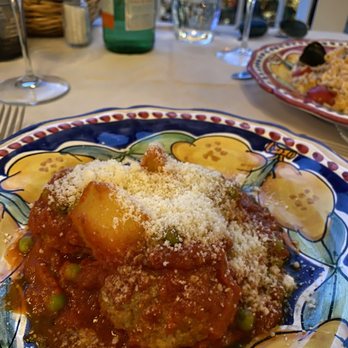 Buca di Bacco - Meatballs with red sauce and parmigiana on top. - Italian Near Me - Positano, SA Buca di Bacco - Meatballs with red sauce and parmigiana on top. - Italian Near Me - Positano, SA