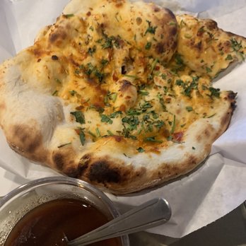 Malhi's Indian Cuisine - Spicy Garlic Naan - Indian Near Me - Lancaster, California Malhi's Indian Cuisine - Spicy Garlic Naan - Indian Near Me - Lancaster, California