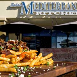 Saba's Mediterranean Kitchen - Loaded gyro fries, spicy feta style. Yummy