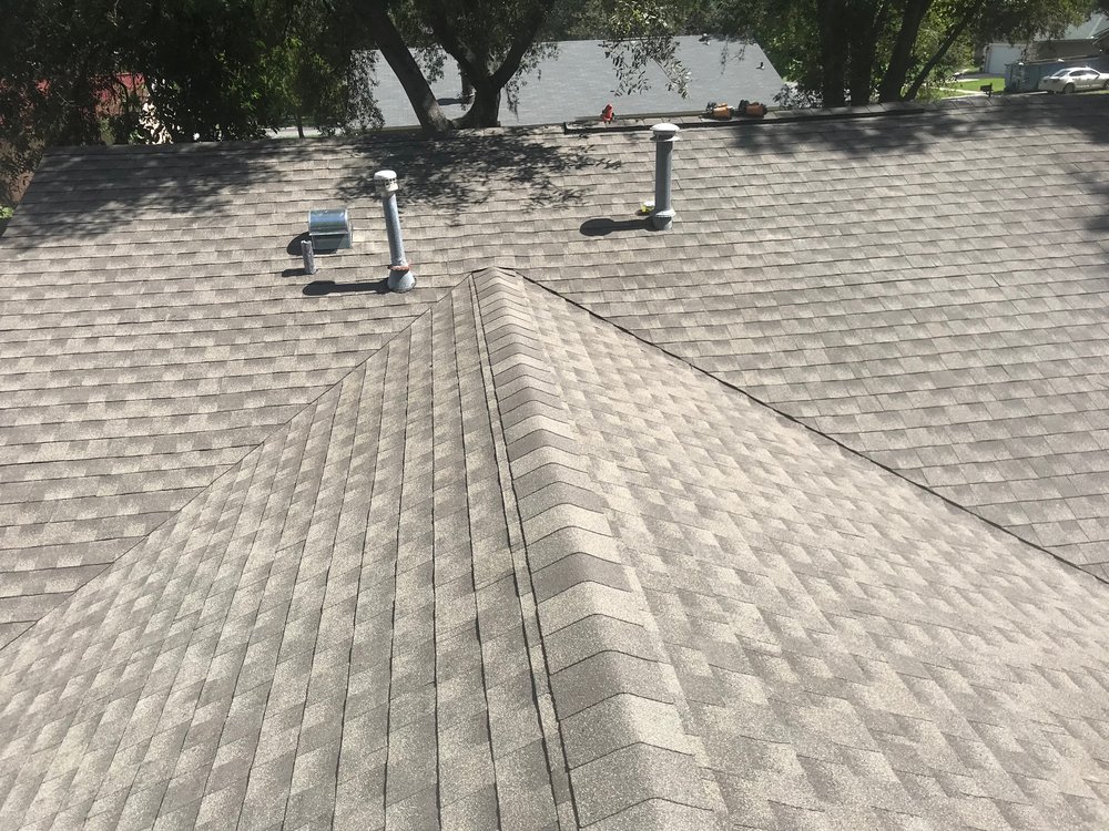 Slide of Veritas Roofers