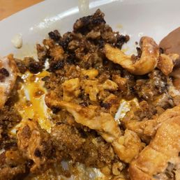 a plate of food with meat and rice a plate of food with meat and rice