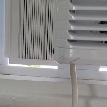 Prince Albert Guest House - Look at the gaps around the AC unit. Easy access for bugs & the elements. - Guest Houses Near Me - Provincetown, Massachusetts