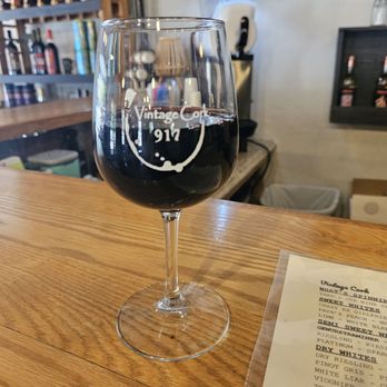 Vintage Cork 917 - a glass of wine on a bar - Wine Tasting Room Near Me - Ben Wheeler, Texas Vintage Cork 917 - a glass of wine on a bar - Wine Tasting Room Near Me - Ben Wheeler, Texas