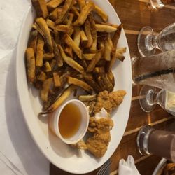 Ipperwash Beach Club Tap &Grill - Chicken fingers & Fries with gravy and plum sauce 10/10 would recommend. Crisp and soft at the same time.