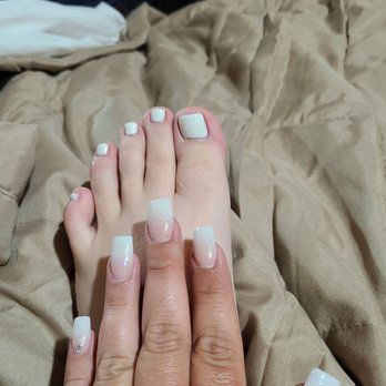 CosmoSpa - Hombre nails and if you zoom in on the toes you can see where she missed a little on the sides. - Nail Salons Near Me - San Angelo, Texas