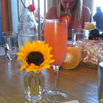Avenue - Champagne cocktail with muddled strawberries, and a gorgeous sunflower :) - French Near Me - Long Branch, New Jersey Avenue - Champagne cocktail with muddled strawberries, and a gorgeous sunflower :) - French Near Me - Long Branch, New Jersey