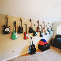 Picture Hanging with US - Guitar collections look great on the wall, give Us a call or request a free consultation www.PictureHangingwithUs.com/contact-us