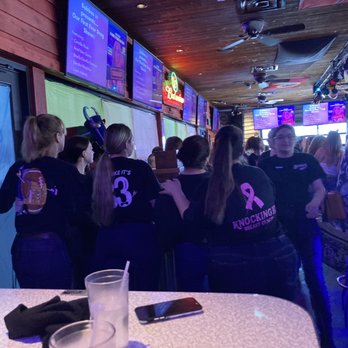 Bubba's 33 - Huddle of employees standing in front of us, blocking our view during the drag brunch - Pizza Near Me - Glen Burnie, Maryland