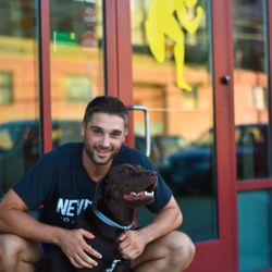 Urban Fitness - Coach Jesse showing Winston proper form of scratching