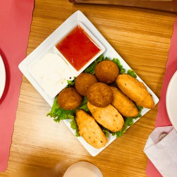 Mrs Potato - Appetizer 1/2 cheese balls and 1/2 fried Cod Fritters - Brazilian Near Me - Orlando, Florida Mrs Potato - Appetizer 1/2 cheese balls and 1/2 fried Cod Fritters - Brazilian Near Me - Orlando, Florida