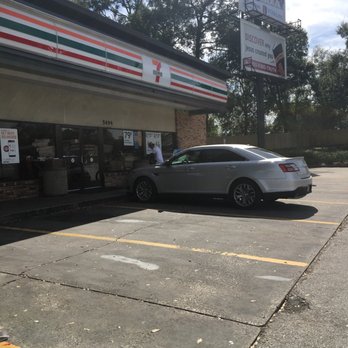 7-Eleven - a car parked in front of a convenience store - Convenience Stores Near Me - Orlando, Florida 7-Eleven - a car parked in front of a convenience store - Convenience Stores Near Me - Orlando, Florida