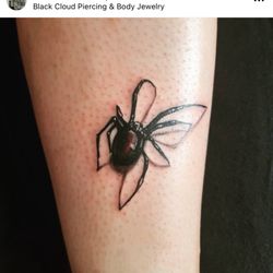 Black Cloud Tattoo and Piercing