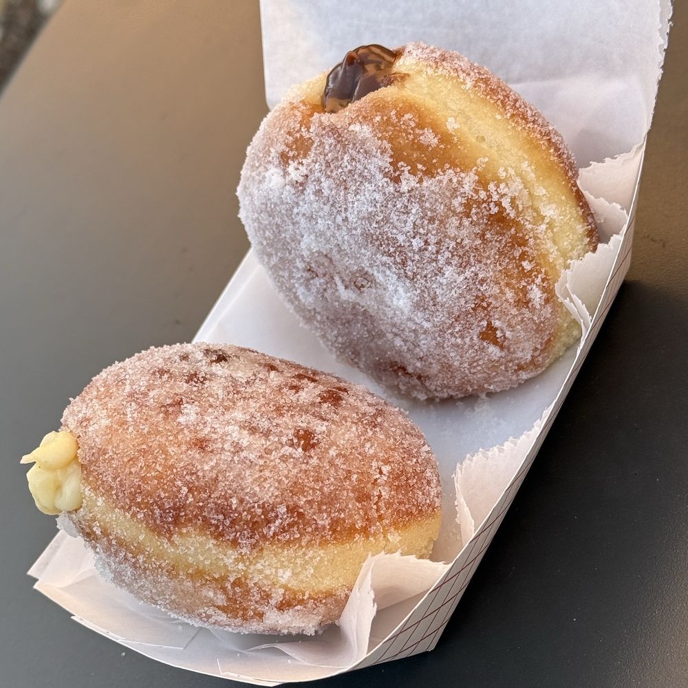 Ollie's Malasadas - Vanilla filled and Nutella filled - Donuts Near Me - Windsor, Colorado Ollie's Malasadas - Vanilla filled and Nutella filled - Donuts Near Me - Windsor, Colorado