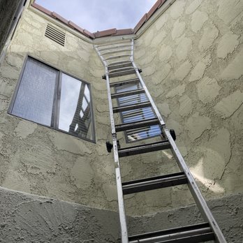 Cal Termite and Pest Control - Atrium replacing fascia board under roof tile - Pest Control Near Me - Ventura, California Cal Termite and Pest Control - Atrium replacing fascia board under roof tile - Pest Control Near Me - Ventura, California