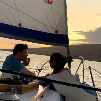 Maui Custom Charter - Enjoying apps on the sunset sail - Boat Charters Near Me