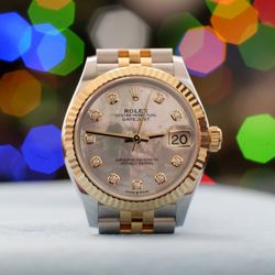 Ben Bridge Jeweler - 31mm Datejust Mother of Pearl dial, two tone w/diamond indices. Regina helped us get this first Rolex for my wife!