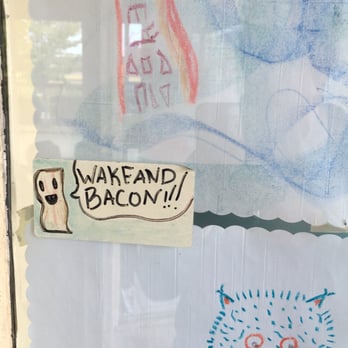 The Red Wagon - Artwork in window! Wake and bacon! - Diners Near Me - Vancouver, British Columbia
