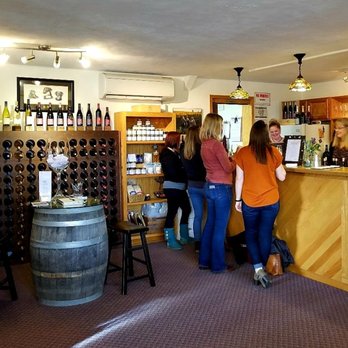 Kramer Vineyards - a group of people in a wine shop - Wineries Near Me - Carlton, Oregon Kramer Vineyards - a group of people in a wine shop - Wineries Near Me - Carlton, Oregon