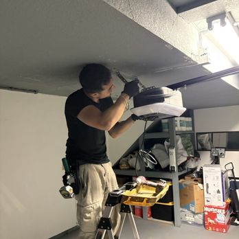 Dream Garage Door & Gate - Mike setting up the new garage door opener - Garage Door Services Near Me - Encino, California