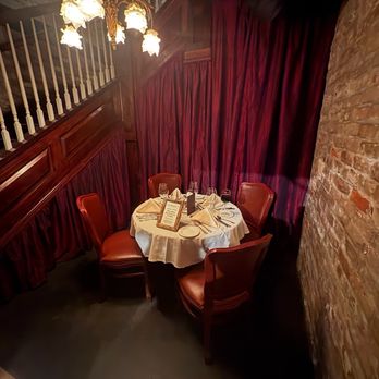 Muriel's Jackson Square - Table for their resident ghost (see his glass of wine) - Cajun/Creole Near Me - New Orleans, Louisiana Muriel's Jackson Square - Table for their resident ghost (see his glass of wine) - Cajun/Creole Near Me - New Orleans, Louisiana