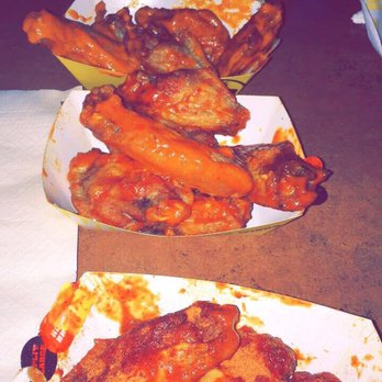 Buffalo Wild Wings - 5 Spicy Garlic, 5 Parmesan Garlic, 5 Wild, and 5 Hot BBQ w/ Chipotle BBQ + a side order of Mozzarella Sticks - American Near Me - Midvale, Utah