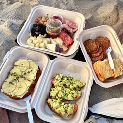 Ernie's Craft Deli and Wine Bar - Curry chicken salad and apple and brie bruschetta with an plentiful charcuterie board.