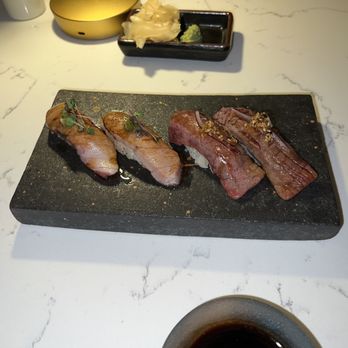Aburi Sushi - Aburi Chutoro on left, A5 wagyu nigiri on the right - Sushi Bars Near Me - Houston, Texas Aburi Sushi - Aburi Chutoro on left, A5 wagyu nigiri on the right - Sushi Bars Near Me - Houston, Texas