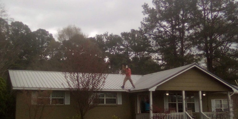 Slide of Kemp's Roofing and Remodeling