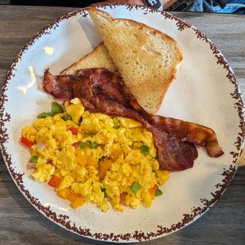 Happy Cafe - This is the Veggie Egg Scrambler (add cheese) breakfast entree.  Photo taken April 17, 2026. - Cafes Near Me - Virginia Beach, Virginia