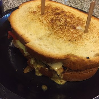Rock n Roll Burger - This is the chicken poblano sandwich which is very flavorful with the melted cheese and poblano peppers. - American Near Me - Simi Valley, California