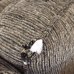 Random hole in love seat back.. There are two