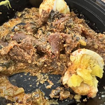 Mama Wale’s Rice & Grill - Pounded Yam (Fufu) Goat (Egusi) side note the goat is gamey - African Near Me - Moreno Valley, California Mama Wale’s Rice & Grill - Pounded Yam (Fufu) Goat (Egusi) side note the goat is gamey - African Near Me - Moreno Valley, California