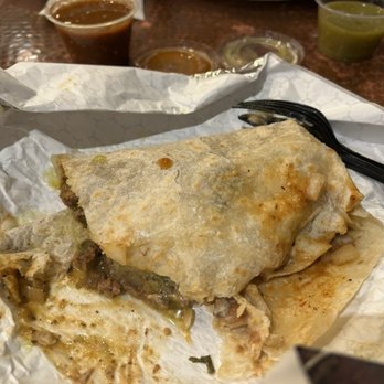 Fresh Mexican Grill - Half eaten burrito carne asada - Mexican Near Me - Las Vegas, Nevada