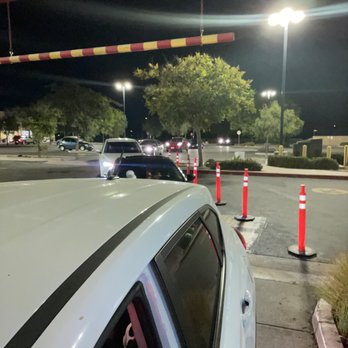 McDonald's - a white car parked at a drive - thru - Fast Food Near Me - Moreno Valley, California