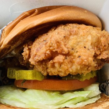 PDQ Chicken - a chicken sandwich with lettuce, tomato, and pickles - Chicken Shop Near Me - Deerfield Beach, Florida