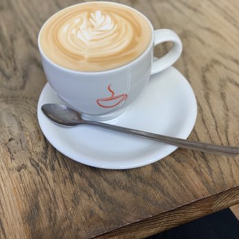 Strada Café - Table area with beautiful coffee - Coffee & Tea Near Me - Paris, 75 Strada Café - Table area with beautiful coffee - Coffee & Tea Near Me - Paris, 75