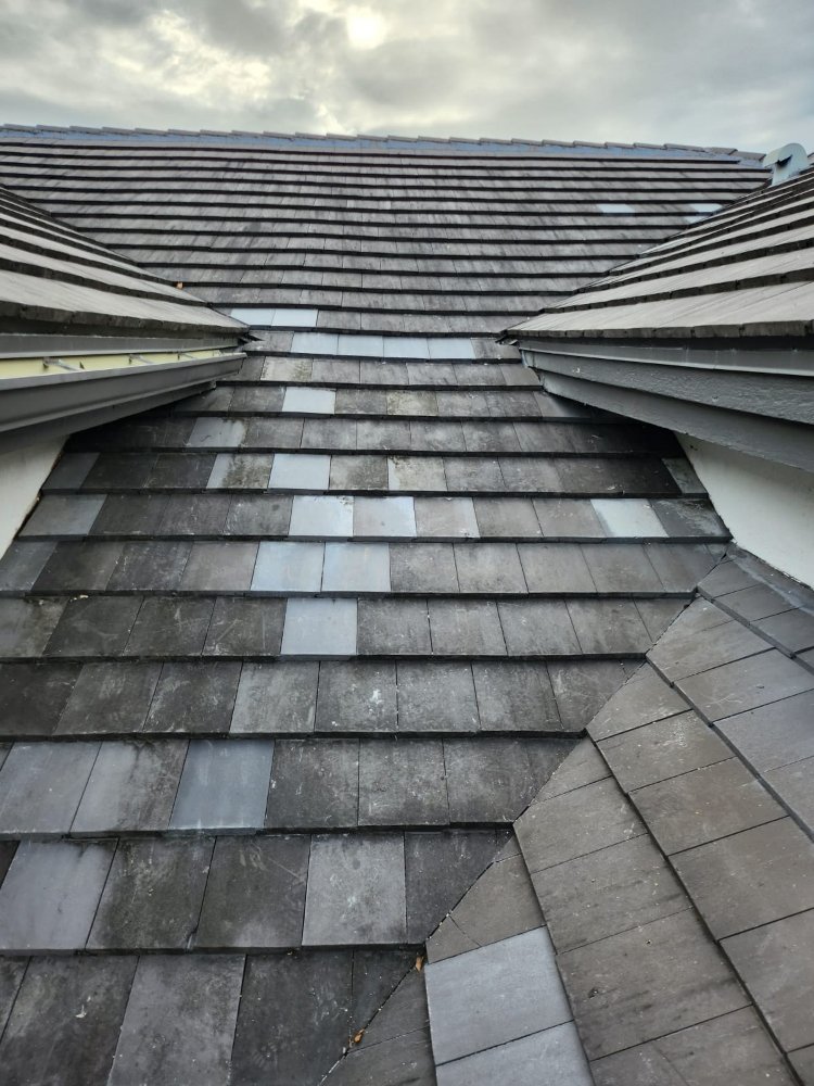 Slide of Extra Myles Roofing