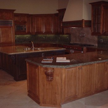 Meridian Home Maintenance - a kitchen with a center island - General Contractors Near Me Meridian Home Maintenance - a kitchen with a center island - General Contractors Near Me