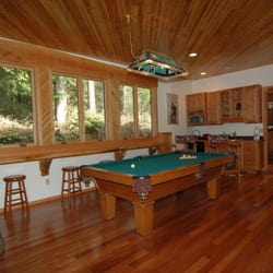 Three Bears Lodge - The bonus room at our Dancing Bears Lodge was recently renovated and has a pool table, woodburning stove, and kitchenette.