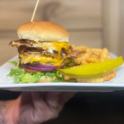 Cedar Creek Tavern - The Hangover Burger  *American cheese, mayo, bacon, sautéed onion, over easy egg