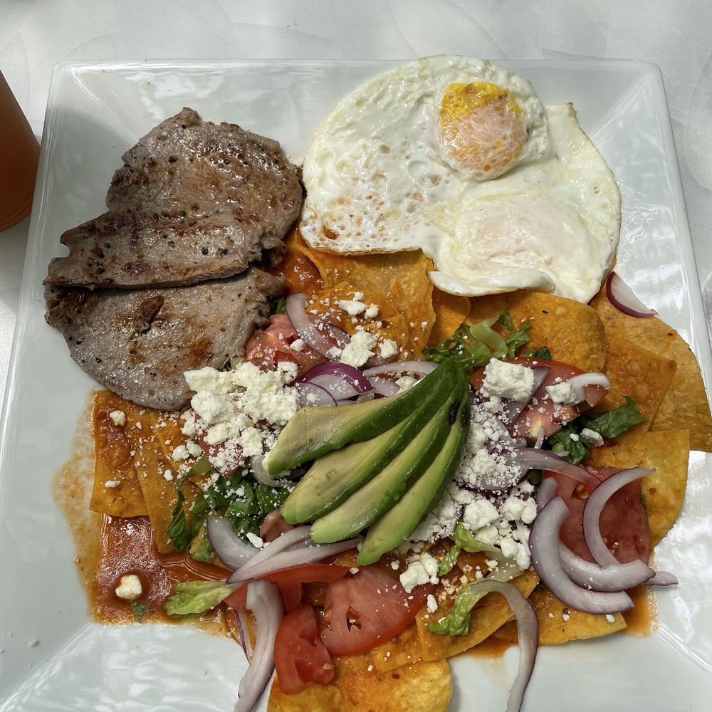 Manjares - Chilaquiles with steak - Breakfast & Brunch Near Me - New Haven, Connecticut Manjares - Chilaquiles with steak - Breakfast & Brunch Near Me - New Haven, Connecticut
