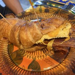 Croissant Breakfast Sandwich with Bacon and Cheddar cheese