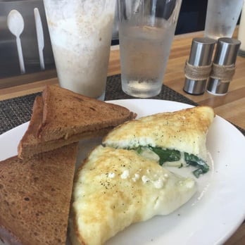 Trigo Café - Whole wheat toast and a egg white, goat cheese and spinach omelette. - Cuban Near Me - Hialeah, Florida Trigo Café - Whole wheat toast and a egg white, goat cheese and spinach omelette. - Cuban Near Me - Hialeah, Florida