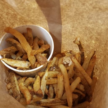 Five Guys - Large fries in the bag. You can hardly see the burger! - Fast Food Near Me - Henderson, Nevada