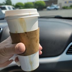 J & L Coffeehouse - Spilled coffee from lid not right.