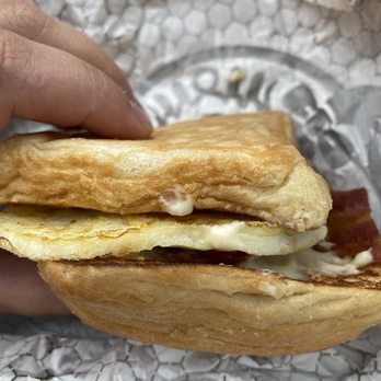 Wendy's - a hand holding a breakfast sandwich - Burgers Near Me - Lake Orion, Michigan Wendy's - a hand holding a breakfast sandwich - Burgers Near Me - Lake Orion, Michigan